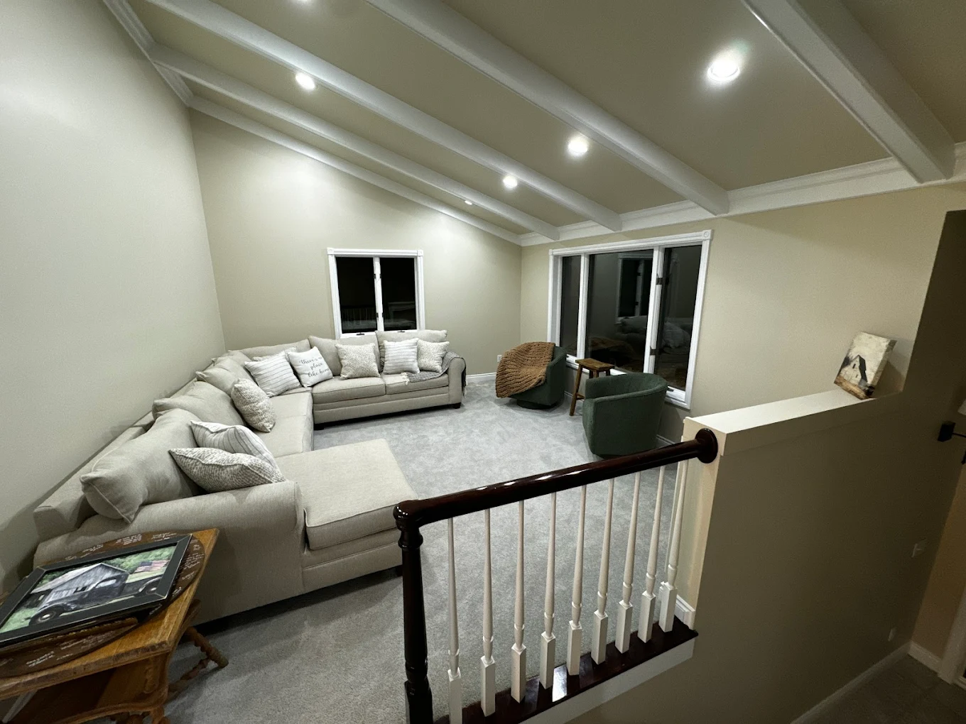 Freshly prepared room with bare walls, drop cloths and painting tools set out before interior painting